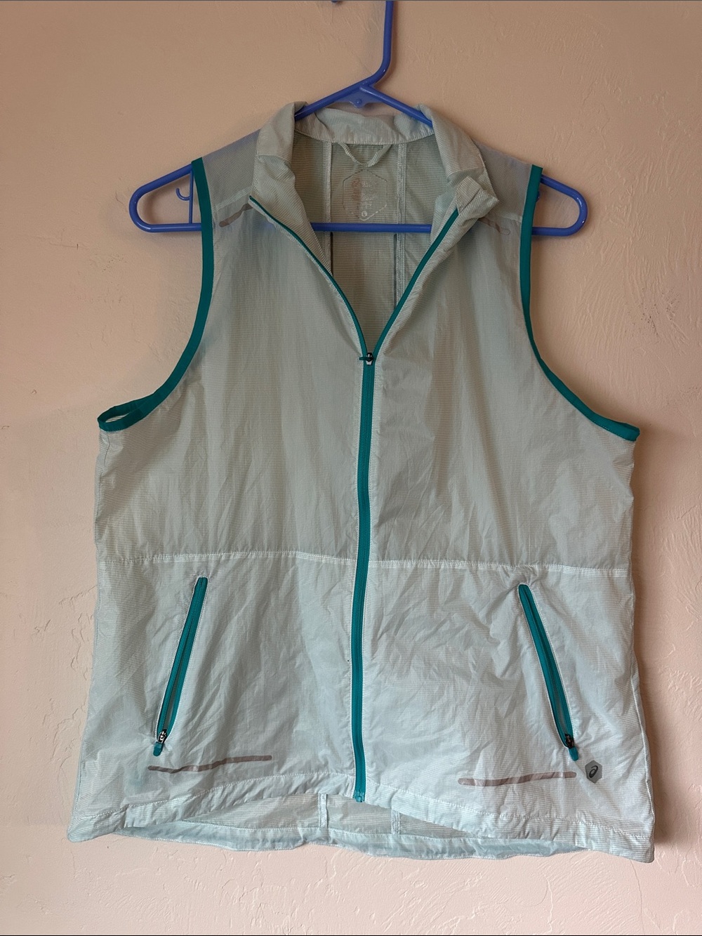 Asics Light Aqua Sleeveless Vest with Teal Trim